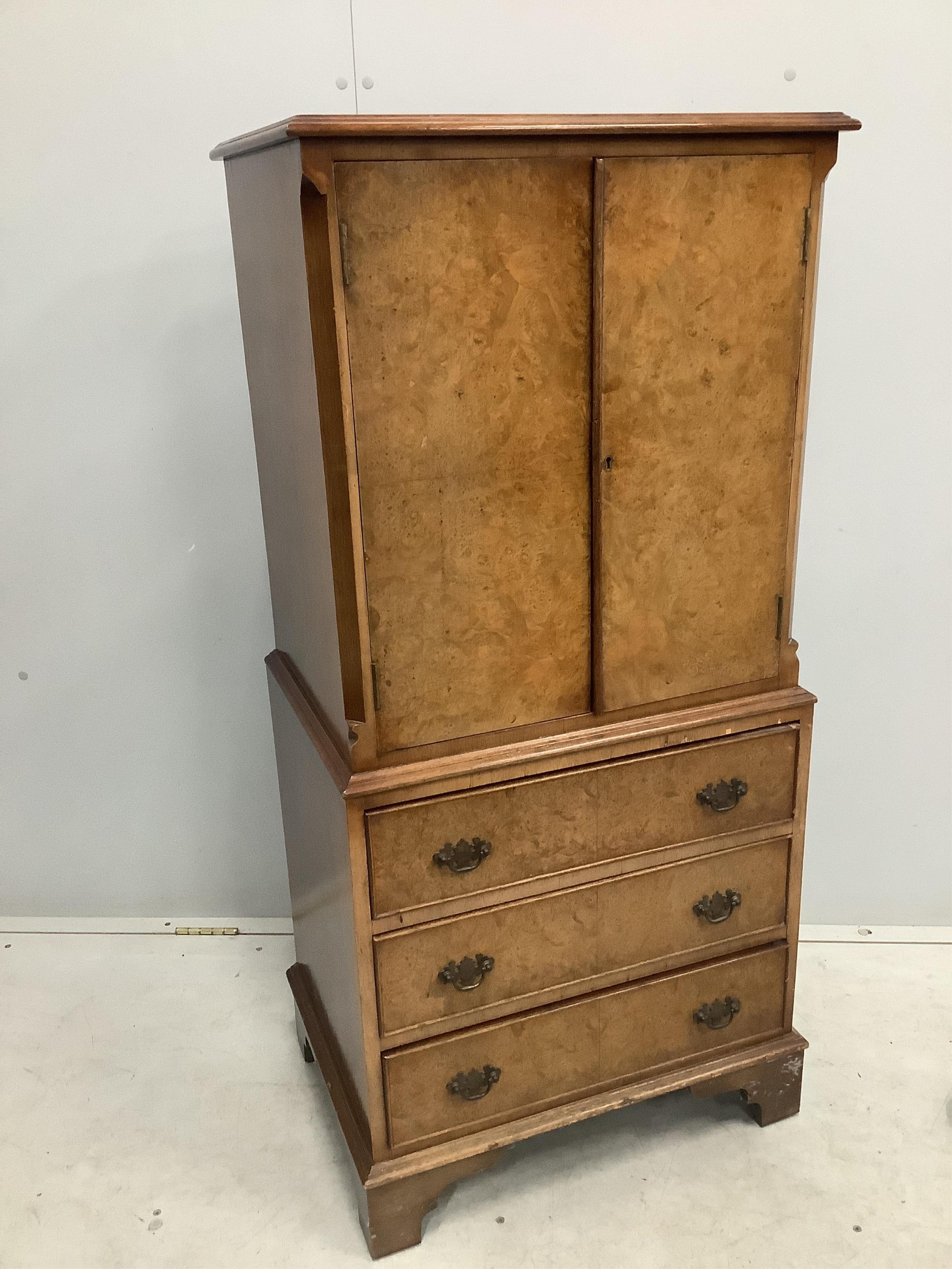 A Queen Anne Revival walnut cocktail cabinet, width 58cm, depth 43cm, height 126cm. Condition - fair to good